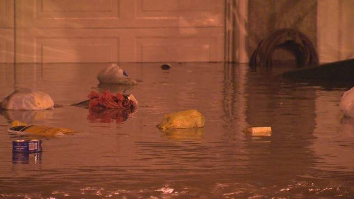 Flooding in Saint-Michel-Parc-Extension, after a water main break. Friday, Oct. 30, 2015.