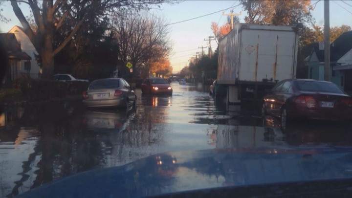 Flooded streets in in Saint-Michel-Parc-Extension on Friday, Oct. 30, 2015.