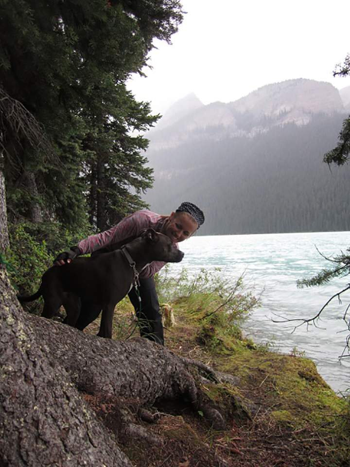 Whitney Stinson with her dog Brüun.