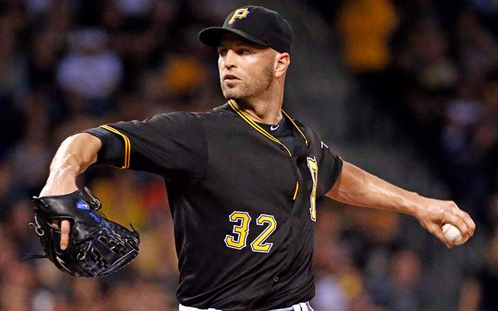 Pittsburgh Pirates starting pitcher J.A. Happ delivers in the first inning of a baseball game against the St. Louis Cardinals, Monday, Sept. 28, 2015, in Pittsburgh. 