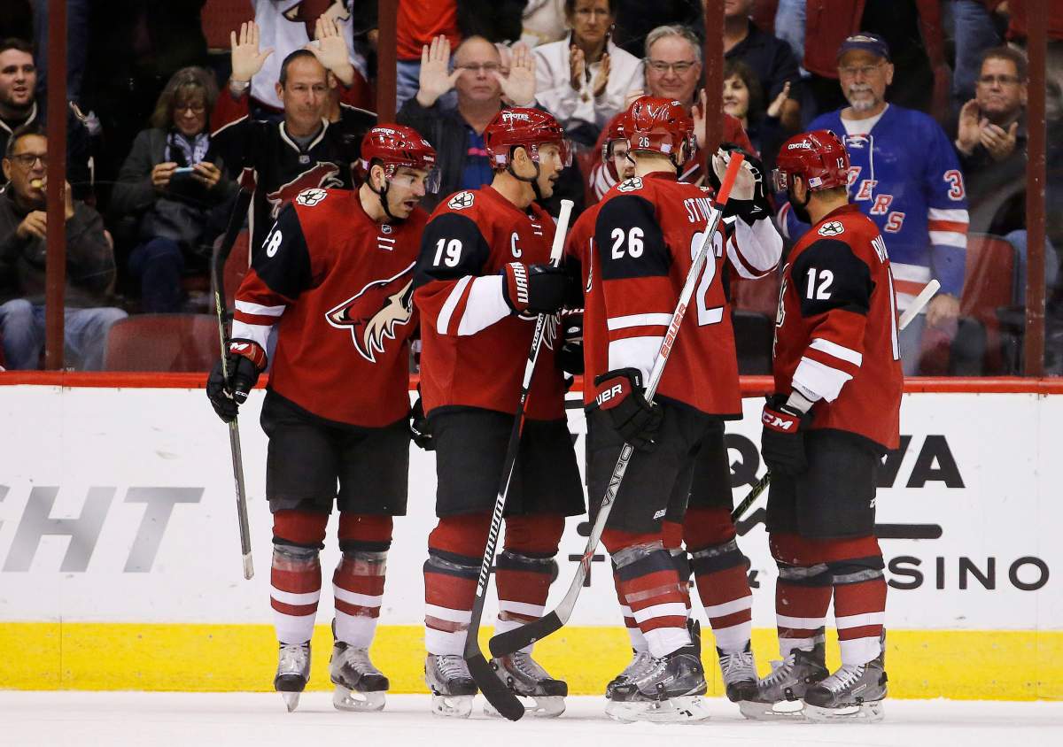 Arizona Coyotes’ Oliver Ekman-Larsson, of Sweden, celebrates his goal against the Edmonton Oilers with teammates Jordan Martinook, left, Shane Doan (19), Michael Stone (26) and Brad Richardson (12) during the first period of an NHL hockey game Thursday, Nov. 12, 2015, in Glendale, Ariz.