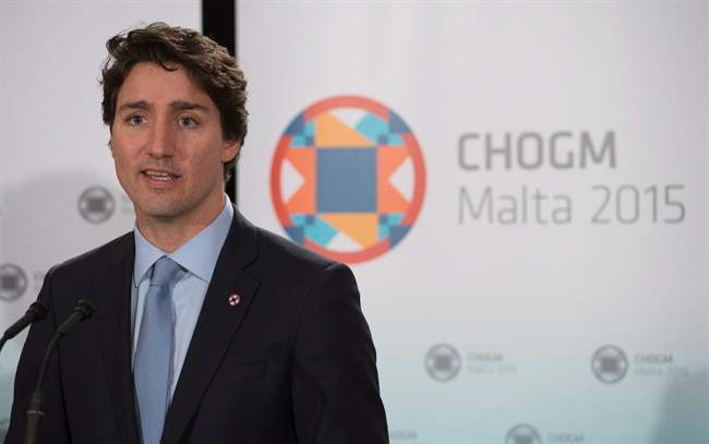 Canadian Prime Minister Justin Trudeau speaks with the media following the Commonwealths Heads of Government meeting in Valletta, Malta Saturday, November 28, 2015. 