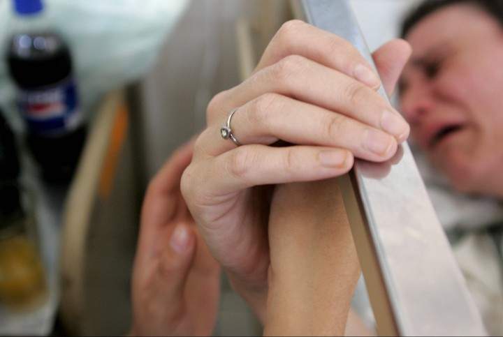 File photo of a woman in hospital.
