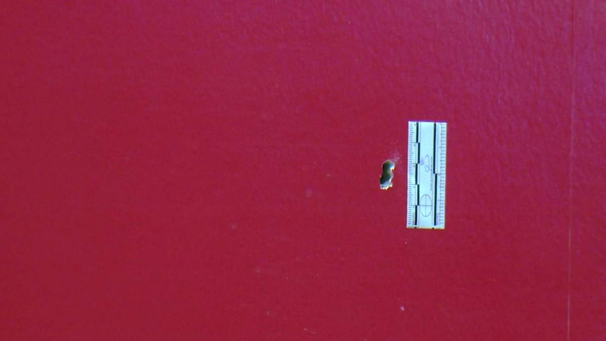A bullet hole is seen in the wall of a McDonald’s located in the 200 block of Stephen Avenue S.W.