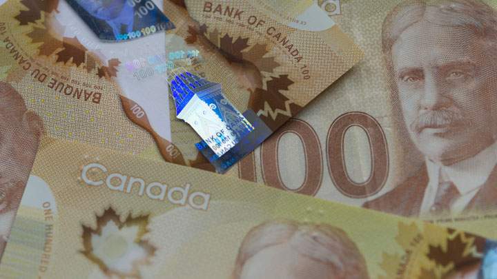 A photo of Canadian $100 bills. Mounties in Kamsack say fake $100 bills have surfaced in the Saskatchewan community.
