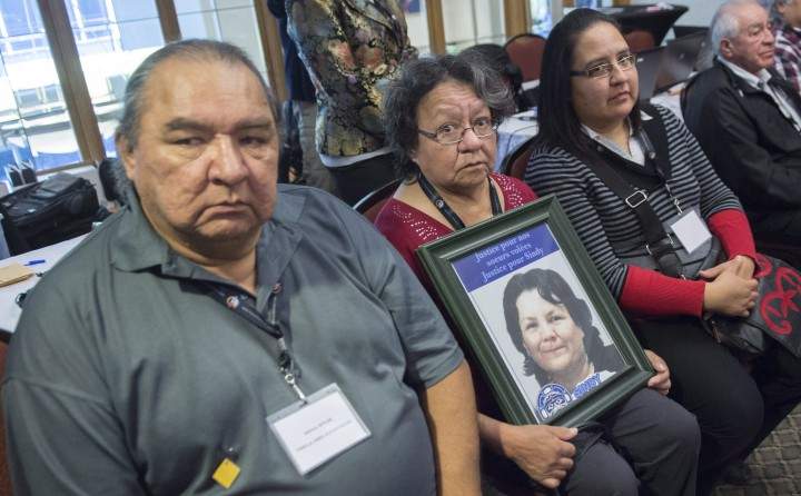 Johnny Wylde and Emilie Ruperthouse-Wylde, parents of Sindy Ruperthouse, a missing Algonquin woman, sit in a meeting between native leaders and Quebec Premier Philippe Couillard Wednesday, November 4, 2015 in Montreal.
