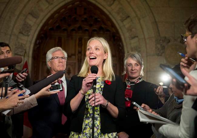 Minister of Environment and Climate Change Catherine McKenna speaks to reporters after her swearing-in, in Ottawa, on November 4, 2015. McKenna was in Paris taking part in talks with counterparts from a host of countries to lay the groundwork for this month's global climate change summit.