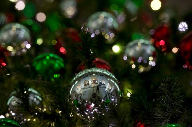 Christmas decorations adorn a tree in Ottawa in a Dec.14, 2014 file photo. 