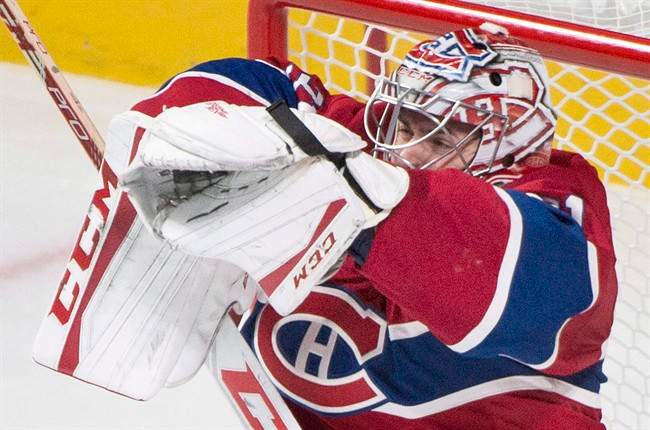 Montreal Canadiens goaltender Carey Price makes a save against the Toronto Maple Leafs during thrid period NHL hockey action in Montreal, Saturday, October 24, 2015.