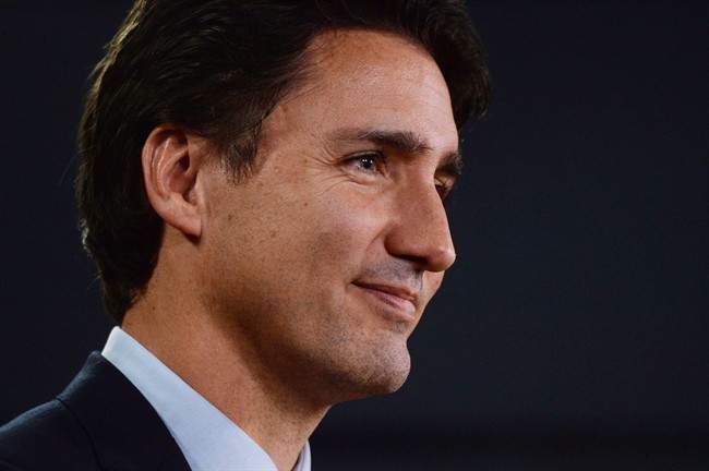 Prime minister-designate Justin Trudeau speaks at the National Press Theatre to during a press conference in Ottawa on Tuesday, October 20, 2015. 
