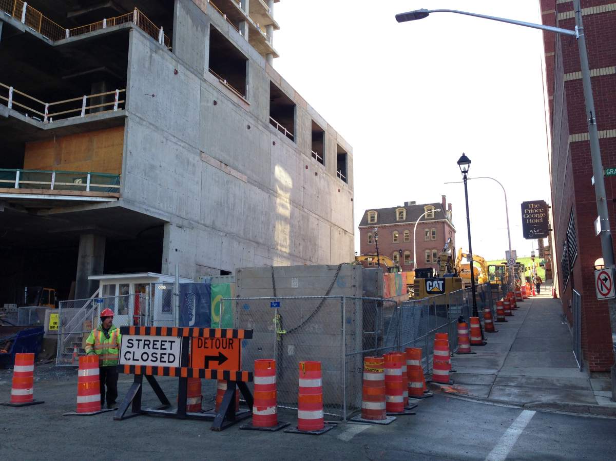 Closed road signs are seen near the construction site of the Nova Centre.