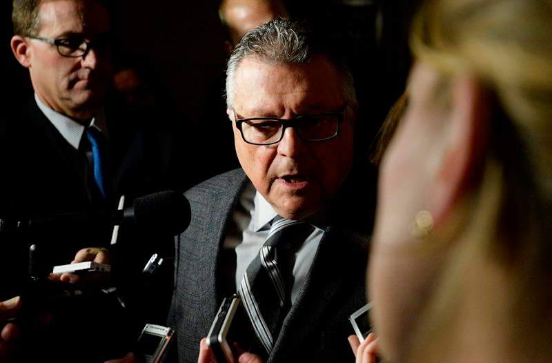 Public Safety Minister Ralph Goodale talks with media in Ottawa on Thursday, Nov. 12, 2015. 