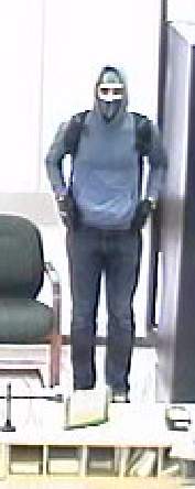 These photos were captured from surveillance video inside the bank.