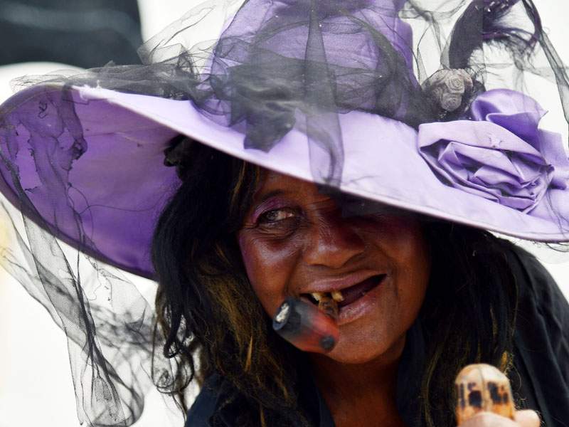 Voodoo followers take part in ceremonies honoring the Haitian voodoo spirits of Baron Samdi and Gede during Day of the Dead.