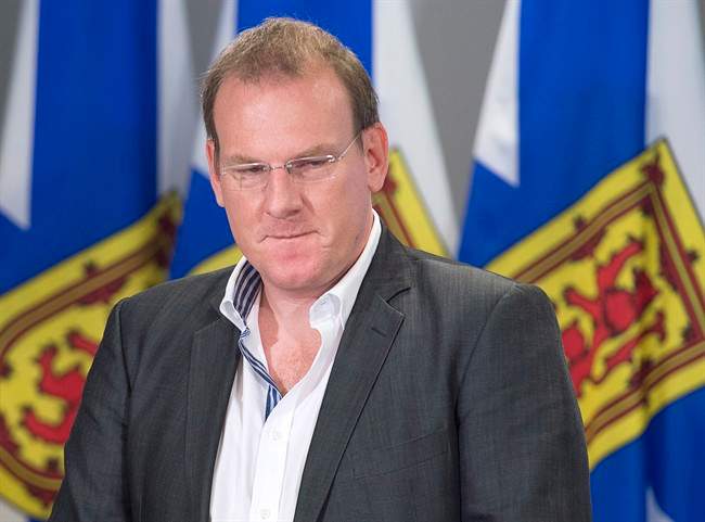 Former Environment Minister Andrew Younger is pictured at a press conference on Nov. 5, 2015.
