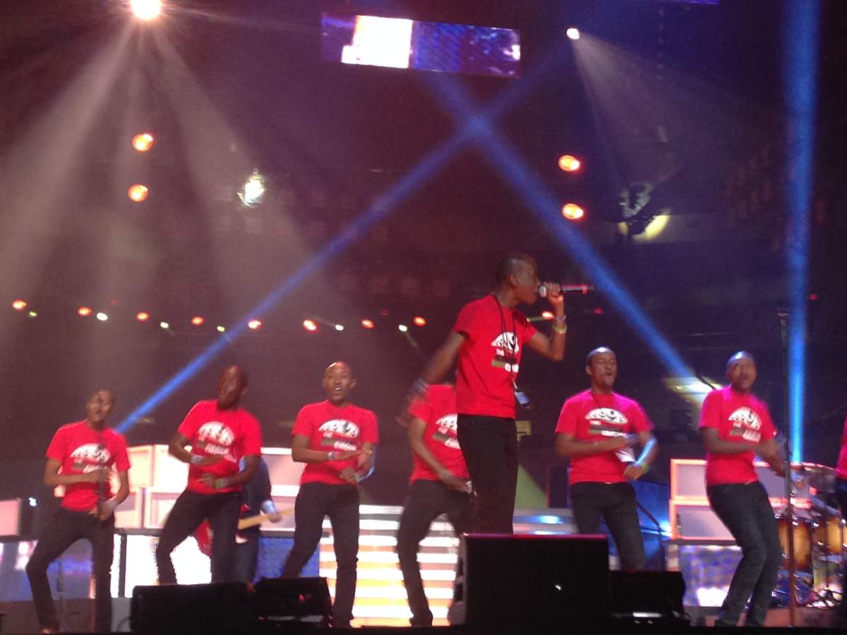 The Kenyan Boys Choir and JRDN perform on stage at the MTS Centre ahead of We Day.