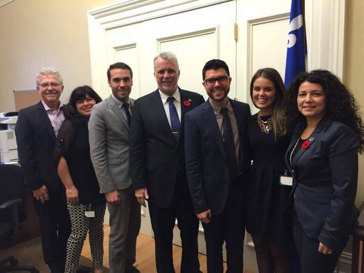 Matthew Schreindorfer and his wife, Katia Luciani pose for a picture at Quebec's National Assembly.