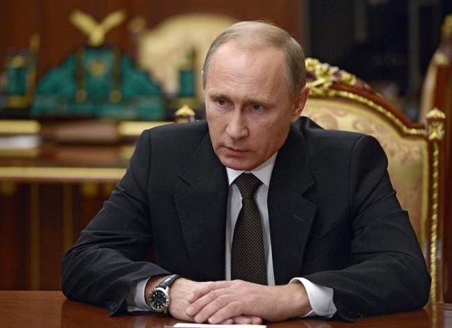 Russian President Vladimir Putin heads a meeting on Russian plane crash in Egypt in Moscow's Kremlin, Russia, early Tuesday, Nov. 17, 2015.