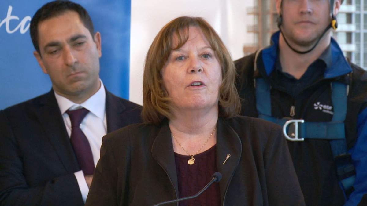 Energy Minister Margaret McCuaig-Boyd discusses the province's plan to transition to renewable energy at a news conference in Calgary on Monday, Nov. 30, 2015. 