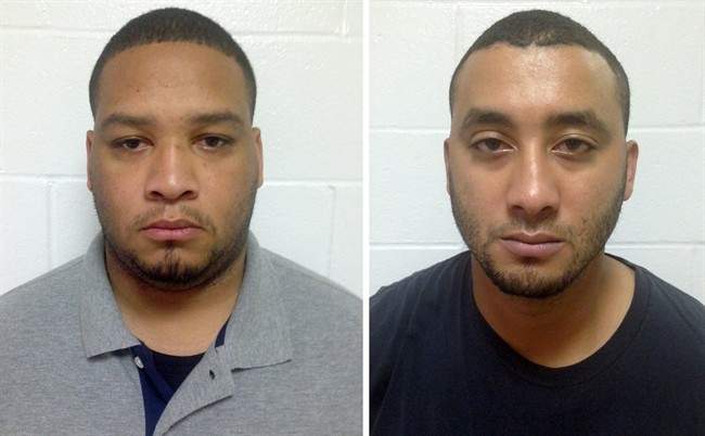In this photo combination shows booking photos provided by the Louisiana State Police, Marksville City Marshal Derrick Stafford, left, and Marksville City Marshal Norris Greenhouse Jr., both were arrested on charges of second-degree murder and attempted second-degree murder in the fatal shooting of Jeremy Mardis, a six-year-old autistic boy, on Tuesday, Nov. 3, 2015 in Marksville, La.