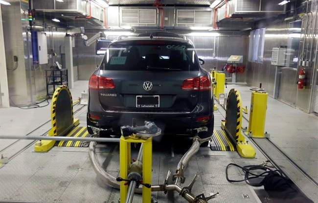 In this Oct. 13, 2015 file photo, a Volkswagen Touareg diesel is tested in the Environmental Protection Agency's cold temperature test facility in Ann Arbor, Mich.