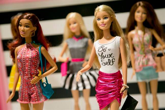 In this Sept. 29, 2015, photo, Barbie Fashionista Dolls from Mattel are displayed at the TTPM Holiday Showcase in New York.