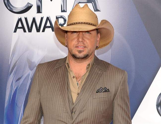 Jason Aldean arrives at the 49th annual CMA Awards in Nashville, Tenn.