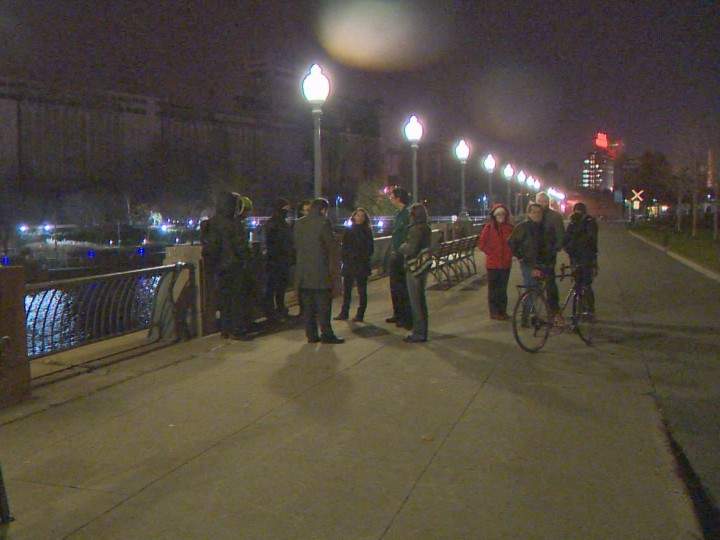 Protesters against the Saint-Lawrence sewage dump start to gather, Tuesday, November 10, 2015.