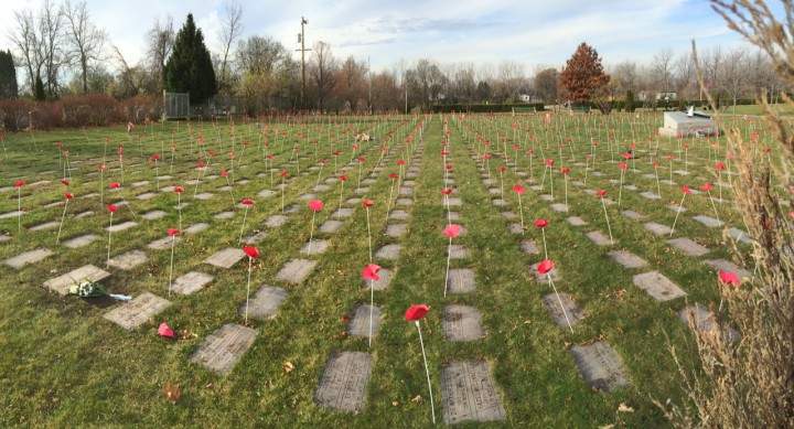 Hundreds gather to pay their respects to Canada's soldiers at the Pointe-Claire National Field of Honour, Tuesday, November 11, 2015.