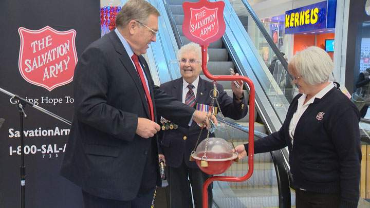 Mayor Don Atchison makes the first donation as the Salvation Army kettle campaign kicked-off in Saskatoon.