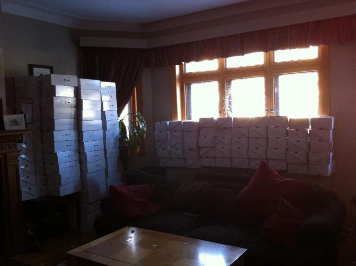 Piles of shoeboxes in Katherine Velan's home.