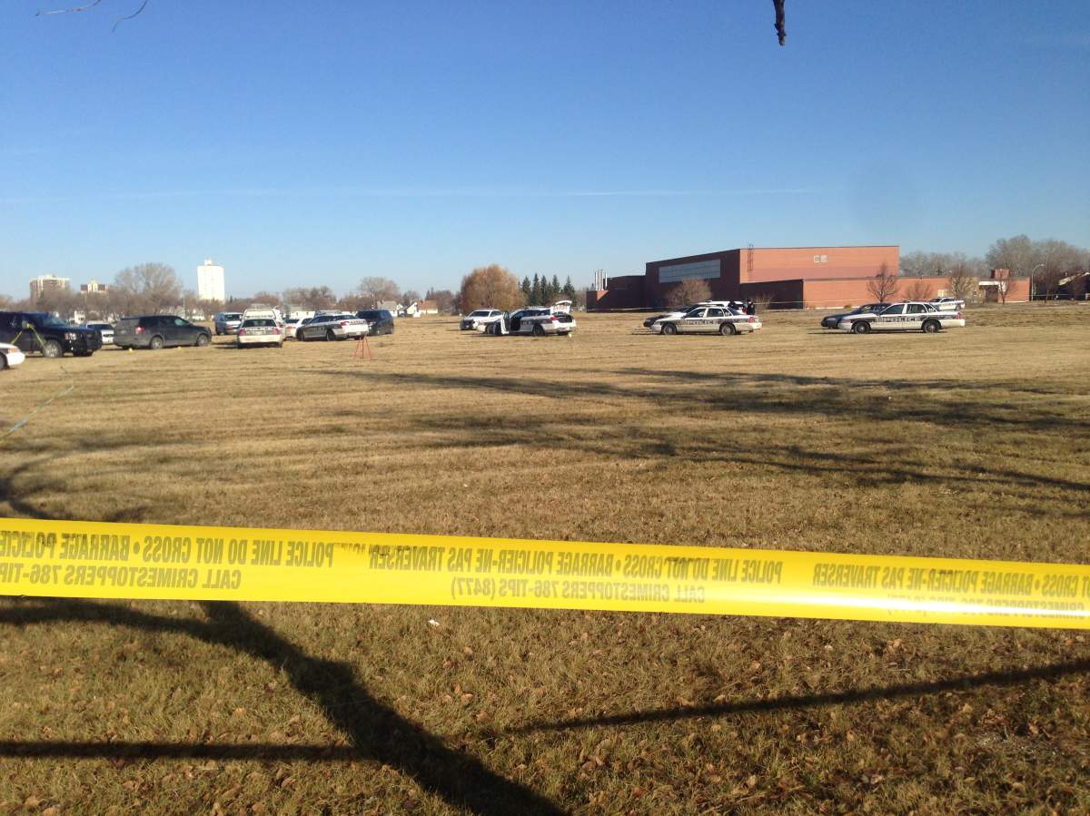Investigators remained on scene hours after Friday's fatal police shooting.  Nov 7, 2015.