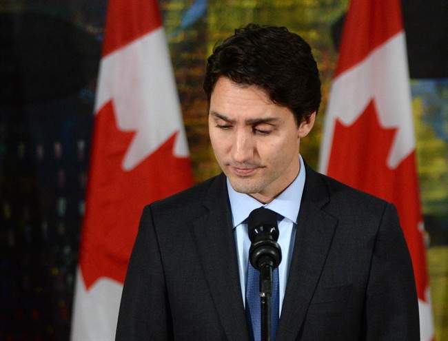 Canadian Prime Minister Justin Trudeau pauses as he addresses the media on the terrorist attacks in Paris prior to his departure for the G20 and APEC summits from Ottawa, Friday November 13, 2015. Trudeau says Canada has offered all the support it can to France following Friday’s attacks in Paris. THE CANADIAN PRESS/Sean Kilpatrick