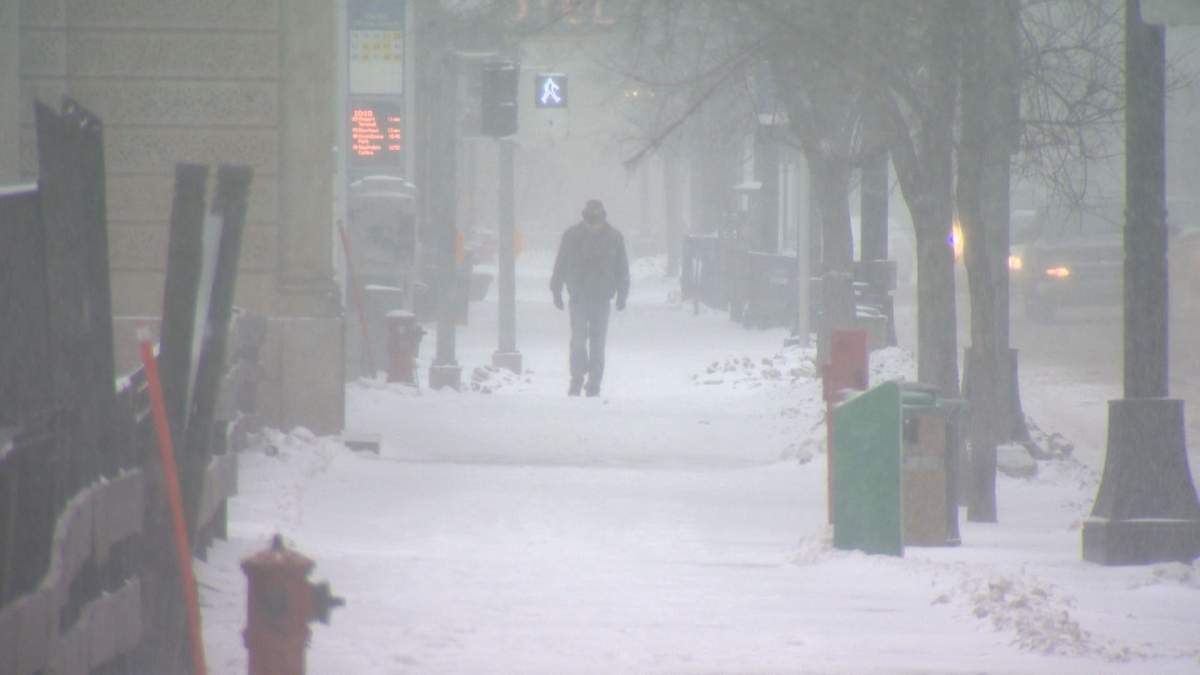 Winnipeggers bundled up for another windy and snowy day.