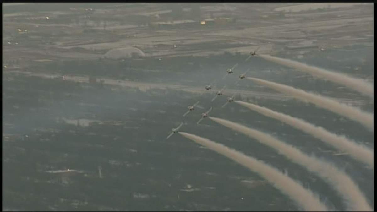 Snowbirds flyby Grey Cup Festival Santa Claus Parade. 