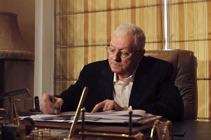 Syrian businessman George Haswan speaks to The Associated Press in his Damascus office, Tuesday Mar. 10, 2015 in Damascus, Syria. The U.S. government imposed sanctions on Hawani, accusing him of being the "middleman" for the Syrian government to buy oil from ISIS. 