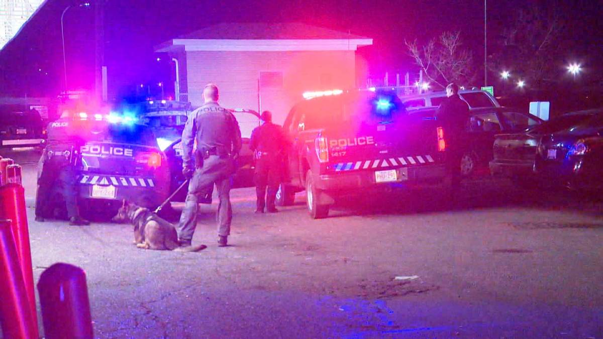 An apparent police takedown is conducted along Marlborough Drive N.E. on Wednesday, Nov. 4, 2015.