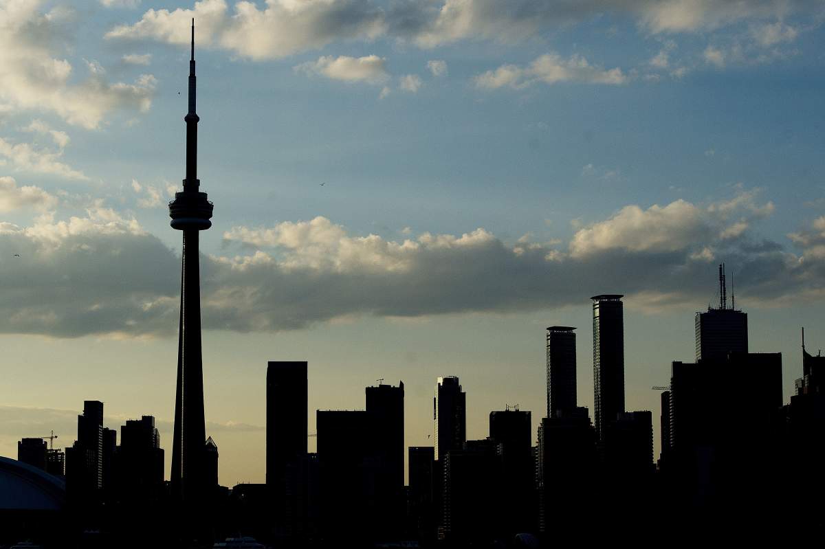 A silhouetted view of the skyline in Toronto, Ontario, on  July 10, 2015.  