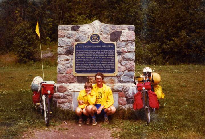 This photo shows Rob and Nancy at the half-way marker on the Trans-Canada Highway back in 1978.