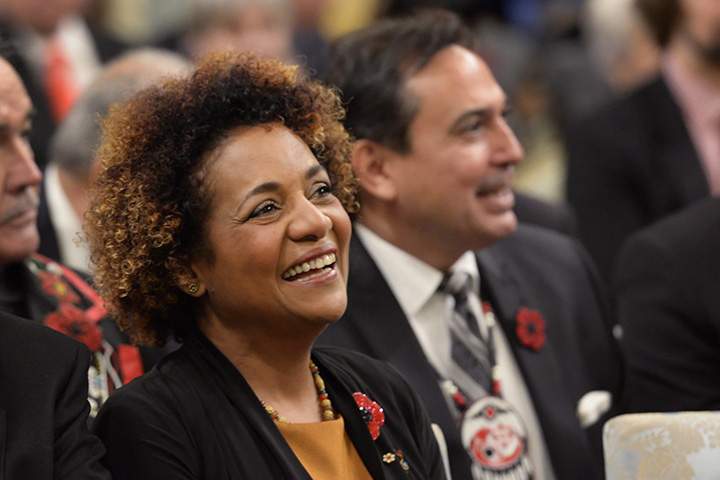 Former Governor General Michaelle Jean laughs at the swearing-in ceremony for Prime minister-designate Justin Trudeau in Ottawa on Wednesday, Nov. 4, 2015.