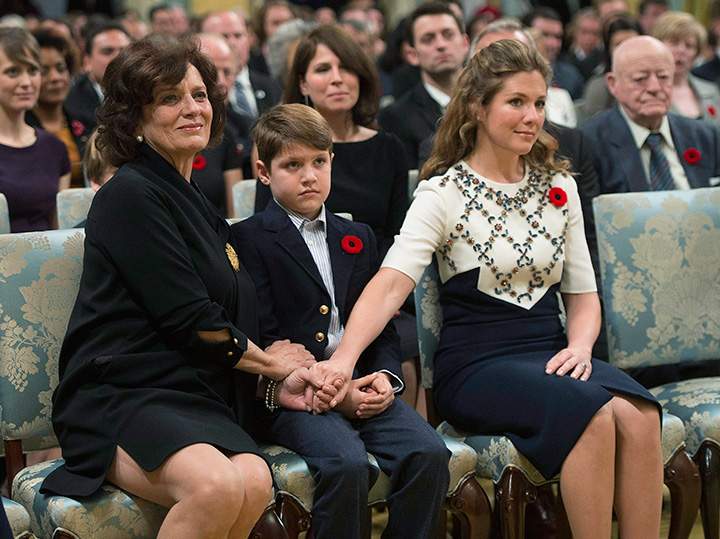 Prime Minister Justin Trudeau’s mother Margaret, left, holds hands with her grandson Xavier and his mother Sophie Gregoire-Trudeau during a swearing-in ceremony at Rideau Hall in Ottawa on Wednesday, November 4, 2015.