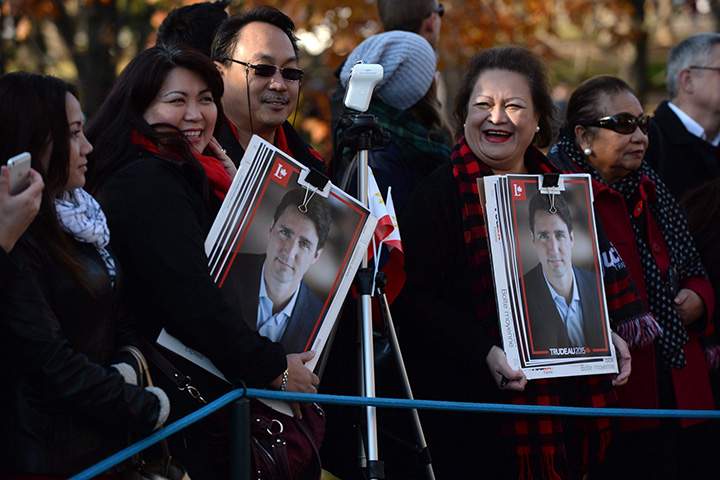 Members of the public wait on the grounds of Rideau Hall before the swearing-in ceremony of Prime Minister-designate Justin Trudeau in Ottawa on Wednesday, Nov. 4, 2015.