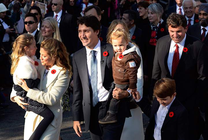 Prime Minister-designate Justin Trudeau, his wife Sophie Gregoire-Trudeau and their children Ella-Grace, Hadrien and Xavier lead the new Liberal cabinet to Rideau Hall in Ottawa on Wednesday, Nov. 4, 2015.