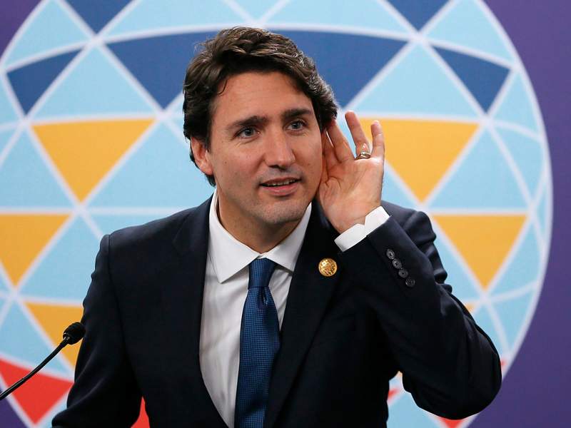 Canadian Prime Minister Justin Trudeau listens to a question during a news conference following the Asia-Pacific Economic Cooperation Summit of Leaders Thursday, Nov. 19, 2015 in Manila, Philippines. Prime Minister Trudeau is embarking on his first foreign trip since becoming a Prime Minister.(AP Photo/Bullit Marquez).