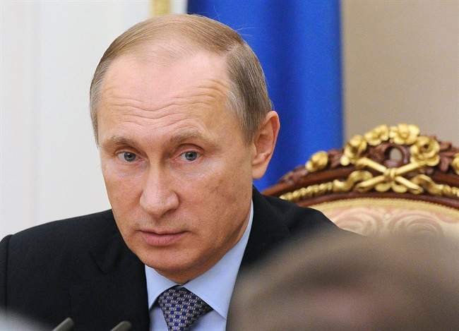 Russian President Vladimir Putin chairs a Security Council meeting at the Novo-Ogaryovo residence outside Moscow, in Russia, Friday, Nov. 6, 2015.