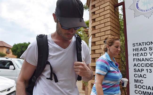 Oscar Pistorius reports for community service at the Garsfontein police station in Pretoria, South Africa, Saturday Nov. 14, 2015. 