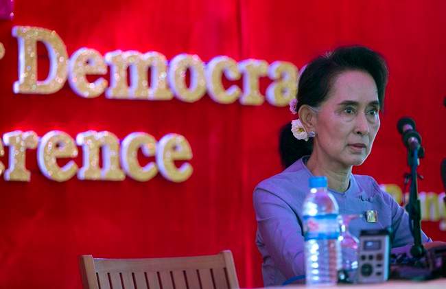 Myanmar's opposition leader Aung San Suu Kyi addresses the media at a press conference at her home in Yangon, Myanmar, Thursday, Nov. 5, 2015.