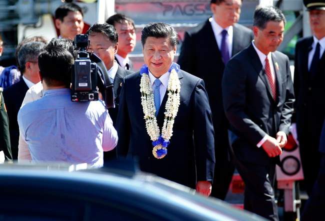China vows to keep economic growth on track, fight climate change - image