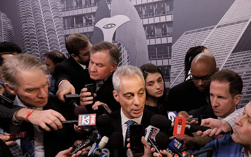 Chicago Mayor Rahm Emanuel speaks to the media, in Chicago. Chicago officials released hundreds of emails Thursday Dec. 31, 2015 related to a video showing a white police officer shooting a black teenager 16 times that wasn't released until more than a year after the shooting. 