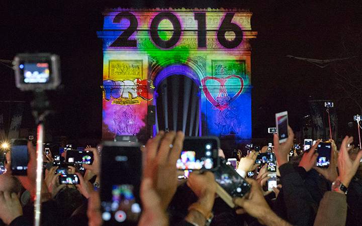 The 2016 appears during the 5-minute video performance displayed on the Arc de Triomphe as part of New Year’s Eve celebrations on the Champs Elysees Avenue in Paris, France, Friday, Jan. 1, 2016.